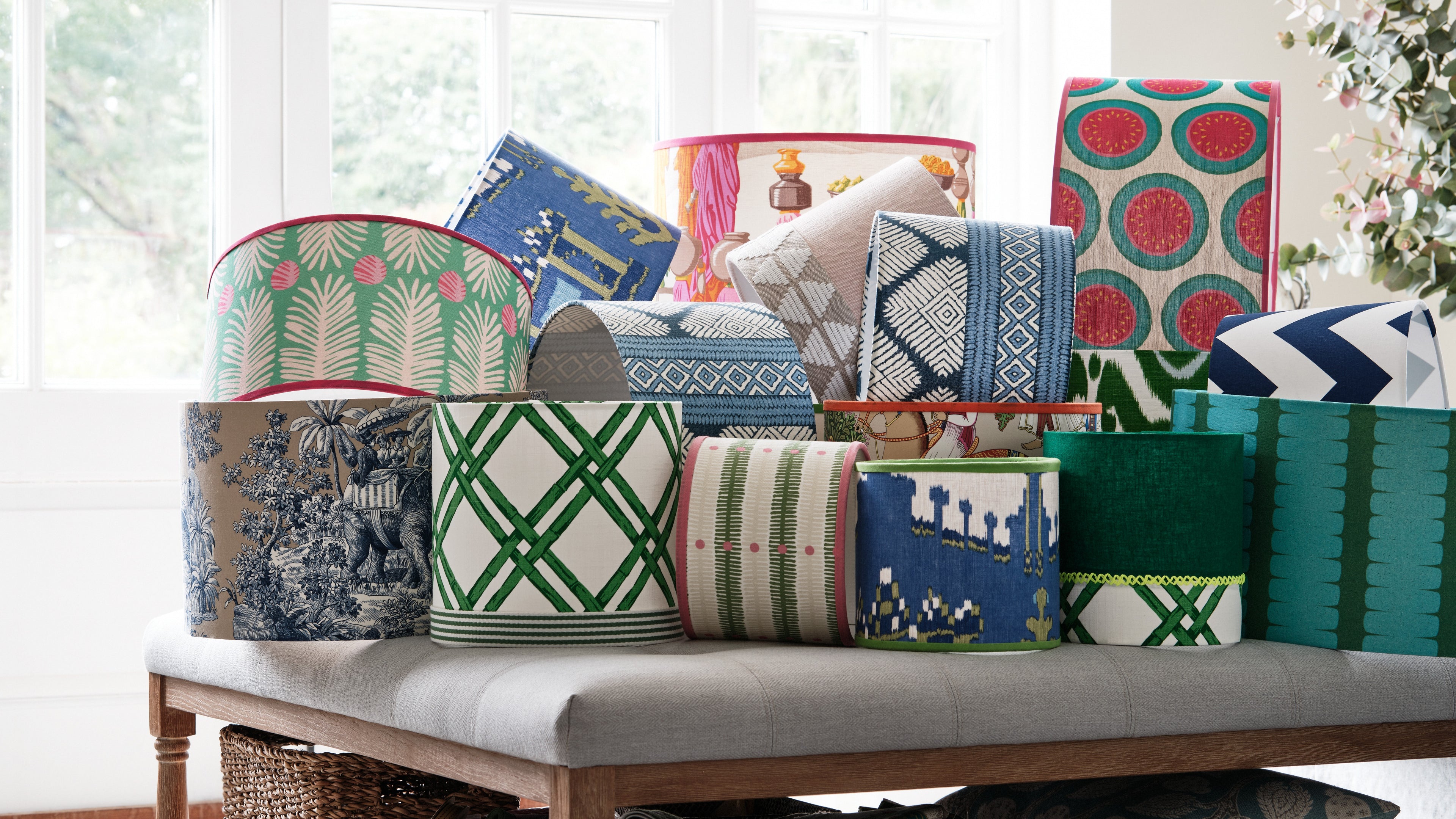  Collection of patterned lampshades on a sofa in a bright room
